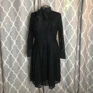 Neck tie lace dress.